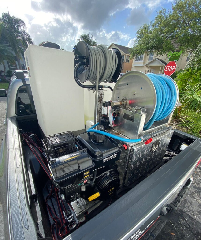 Foundation Pressure & Soft Wash truck with soft wash tanks and hose reels