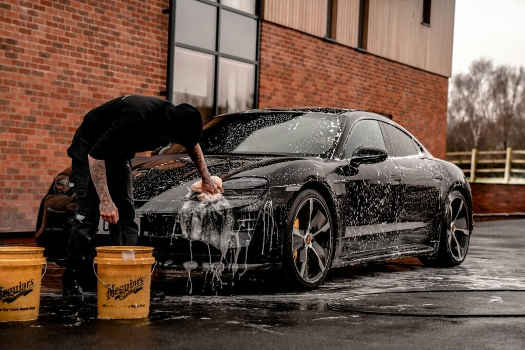 Hand washing a car at home