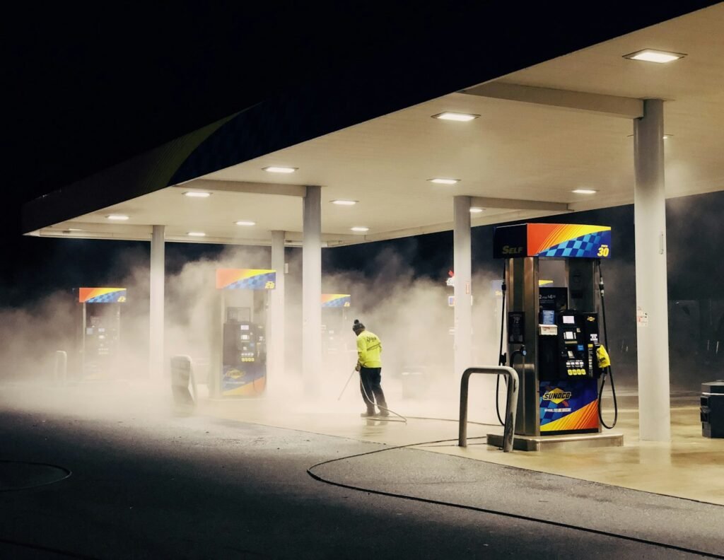 Commercial pressure washing at a gas station