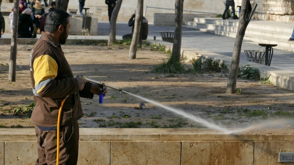 Pressure washing a concrete surface
